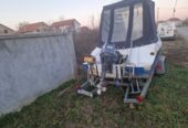 Prodajem camac sa motorom i prikolicom